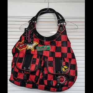 Betsy Johnson black and red tote bag. Fun and chic bag.